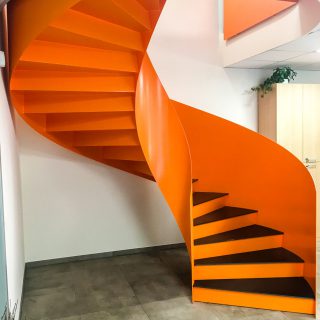 Spiral staircase in calender steel - corporate offices